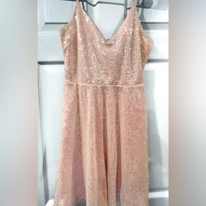 A sparkling light pink dress